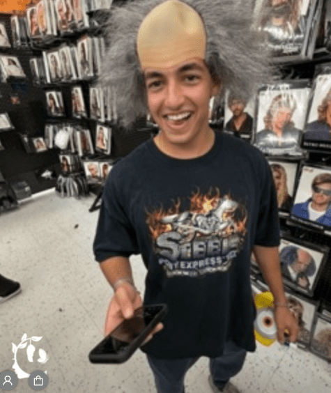 Halloween Costume Shop Shenanigans — Trying on the Mad Scientist Wig